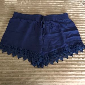 NWOT navy blue shorts.